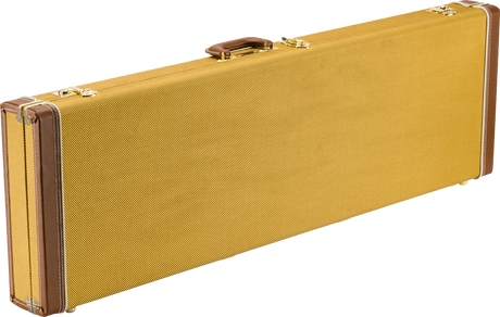The image shows a vintage-style hardshell guitar case with a golden yellow textured exterior, brown leather corner guards, and brass hardware. It features a rectangular, elongated shape with a brown leather handle. The sturdy, professional-grade case is designed to protect and transport electric guitars, reflecting a classic 1950s-60s look.