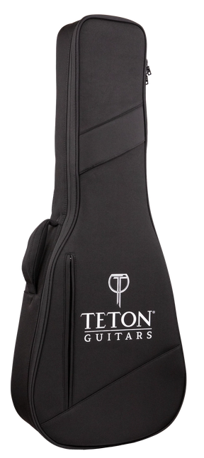The image shows a black Teton Guitars soft gig bag made of durable fabric with padded protection. It features the white Teton logo and "T" symbol on the front, diagonal seam design, dual zippers, a top carrying handle, and a shoulder strap attachment. This lightweight, portable case is ideal for safely transporting acoustic guitars or similar-sized string instruments.