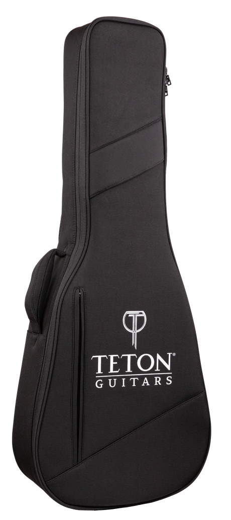 The image shows a black Teton Guitars soft gig bag made of durable fabric with padded protection. It features the white Teton logo and "T" symbol on the front, diagonal seam design, dual zippers, a top carrying handle, and a shoulder strap attachment. This lightweight, portable case is ideal for safely transporting acoustic guitars or similar-sized string instruments.