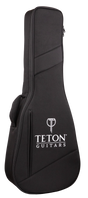 The image shows a black Teton Guitars soft gig bag made of durable fabric with padded protection. It features the white Teton logo and "T" symbol on the front, diagonal seam design, dual zippers, a top carrying handle, and a shoulder strap attachment. This lightweight, portable case is ideal for safely transporting acoustic guitars or similar-sized string instruments.