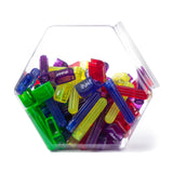 A plastic jar filled with different color guitar pegwinders on a white backround