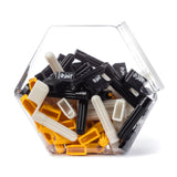 A plastic jar filled with Jim Dunlop guitar string winders in mixed colors on a white background