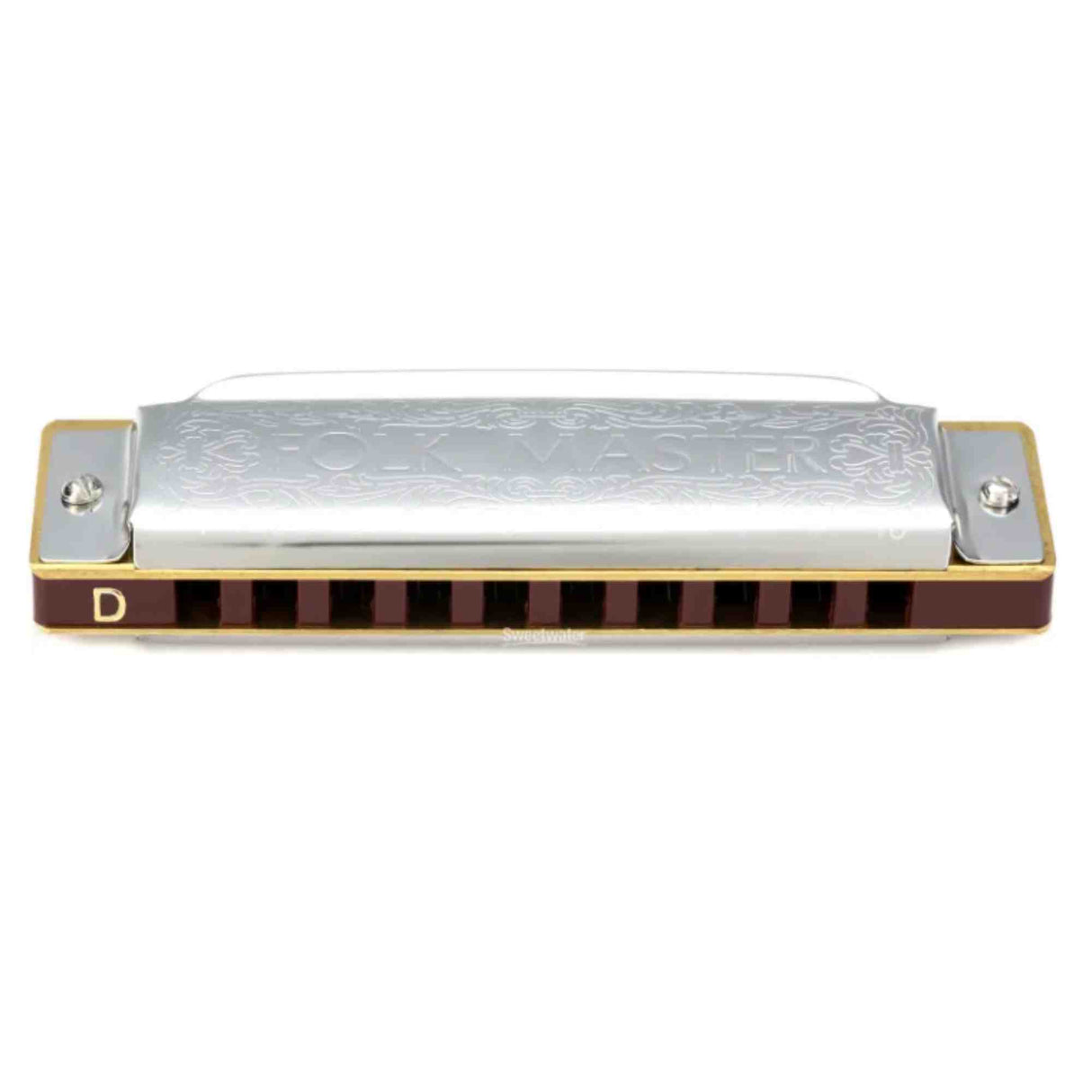 The image shows a 10-hole diatonic harmonica with a chrome top plate engraved with "GOLDEN," dark reddish-brown comb, and metal cover plates. The key of D is marked on the left side, and the harmonica features golden trim. This classic design is commonly used in blues, folk, country, and rock music.