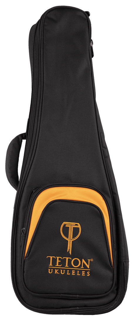 The image shows a TETON UKULELES padded soft gig bag for a ukulele. It is black with orange/amber trim and features a full-length zipper, a front pocket with the Teton logo, carrying handles, and durable fabric. The case has a teardrop shape to fit a ukulele’s body, offering lightweight protection and easy transport, with branding indicating Teton as the manufacturer.