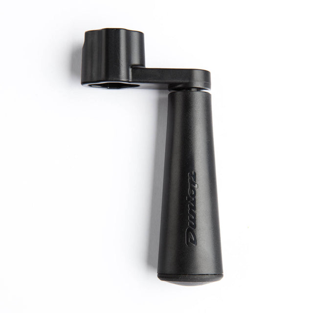 A black guitar stringwinder with Dunlop logo 