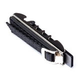 A toggle guitar capo on a white background