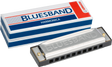 The image shows a Hohner Blues Band 10-hole diatonic harmonica with its original red, white, and blue packaging. The harmonica has a chrome-plated cover embossed with "BLUESBAND," a black plastic comb, and brass reeds inside. The packaging features Hohner branding and the model name. This reliable, entry- to intermediate-level harmonica is popular in blues, folk, and rock music.