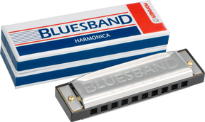 The image shows a Hohner Blues Band 10-hole diatonic harmonica with its original red, white, and blue packaging. The harmonica has a chrome-plated cover embossed with "BLUESBAND," a black plastic comb, and brass reeds inside. The packaging features Hohner branding and the model name. This reliable, entry- to intermediate-level harmonica is popular in blues, folk, and rock music.