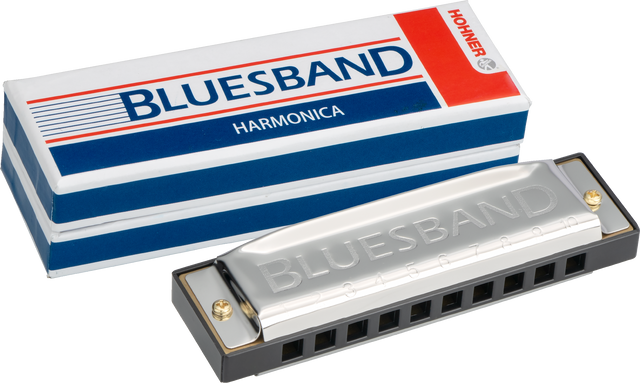 The image shows a Hohner Blues Band 10-hole diatonic harmonica with its original red, white, and blue packaging. The harmonica has a chrome-plated cover embossed with "BLUESBAND," a black plastic comb, and brass reeds inside. The packaging features Hohner branding and the model name. This reliable, entry- to intermediate-level harmonica is popular in blues, folk, and rock music.