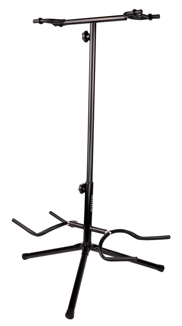 The image shows a black metal dual guitar stand with an adjustable telescoping center pole and a stable tripod base. It has two padded, adjustable arms at the top and a lower support cradle to hold electric or acoustic guitars securely. This space-saving stand is ideal for musicians to display or store two guitars simultaneously, accommodating various sizes for use in studios, stages, or homes.