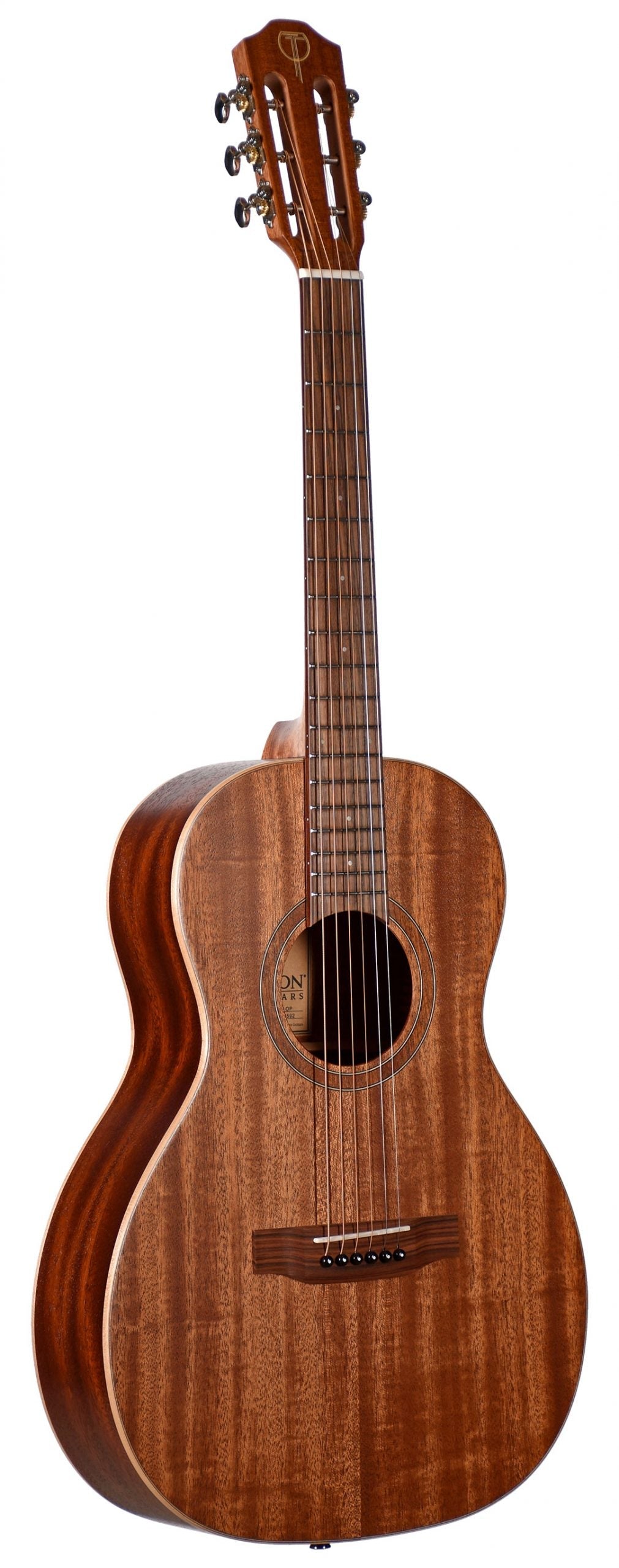 The image shows a classical acoustic guitar with a rich, warm wood finish, likely mahogany. It features a wider neck, six tuning pegs in a 3+3 arrangement, a circular rosette sound hole, a branded headstock, and a traditional bridge. The natural wood grain is visible throughout, highlighting its craftsmanship. This guitar is typically used for fingerstyle, classical, flamenco, and folk music.