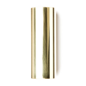 A brass slide for guitar on a white background