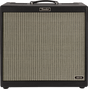 The image shows a Fender ACB 50 combo guitar amplifier with a black textured cabinet, classic woven cream speaker grille, and the Fender logo on top. It features a black leather handle and an "ACB 50" label, indicating a 50-watt amp designed for acoustic guitars. The combo design integrates amplifier and speaker in one portable unit, ideal for performances, recording, or practice.