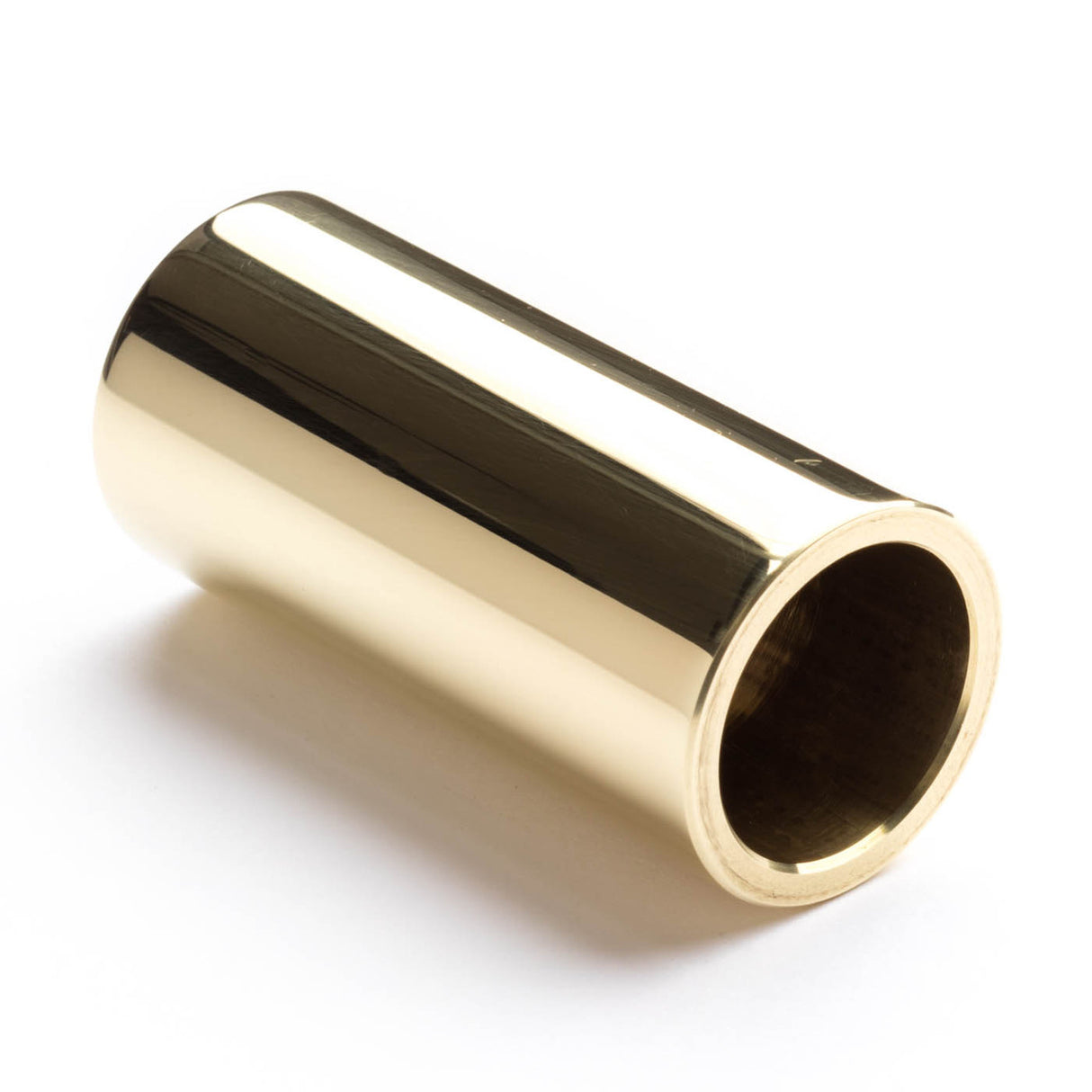 A brass slide for guitar on a white background