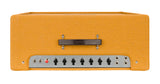 The image shows a vintage-style guitar amplifier head with orange/amber textured tolex and a tweed-like pattern. It has a metal control panel featuring about seven black knobs, input jacks on the left, output jacks on the right, and a red indicator light. A leather or vinyl handle with a brand plate is on top. This classic tube amp head is designed to pair with a speaker cabinet and is typical of 1950s-60s American amps favored by blues, rock, and country guitarists.