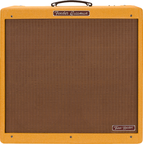 The image shows a Fender Bassman Tone Master guitar amplifier with a lacquered tweed finish, brown/bronze ribbed grill cloth, and a dark brown leather handle. The rectangular combo amp features the Fender logo on the front panel and a "Tone Master" badge on the lower right. This modern digital amp recreates the classic late 1950s Bassman sound, known for its iconic vintage tone popular in blues and rock music.