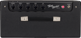 The image shows a Fender Tone Master FR-10 guitar amplifier with black tolex covering. The front panel has five control knobs for Volume, Treble, Middle, Bass, and Output, plus a red power LED and a power switch. It features a sturdy carrying handle for portability. This digital modeling amp replicates classic tube tones with modern lightweight design, ideal for practice, small gigs, or studio use.