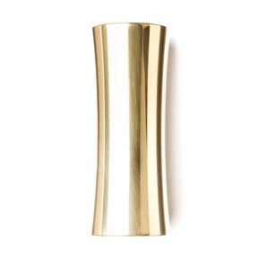 A concave brass slide for guitar on a white background