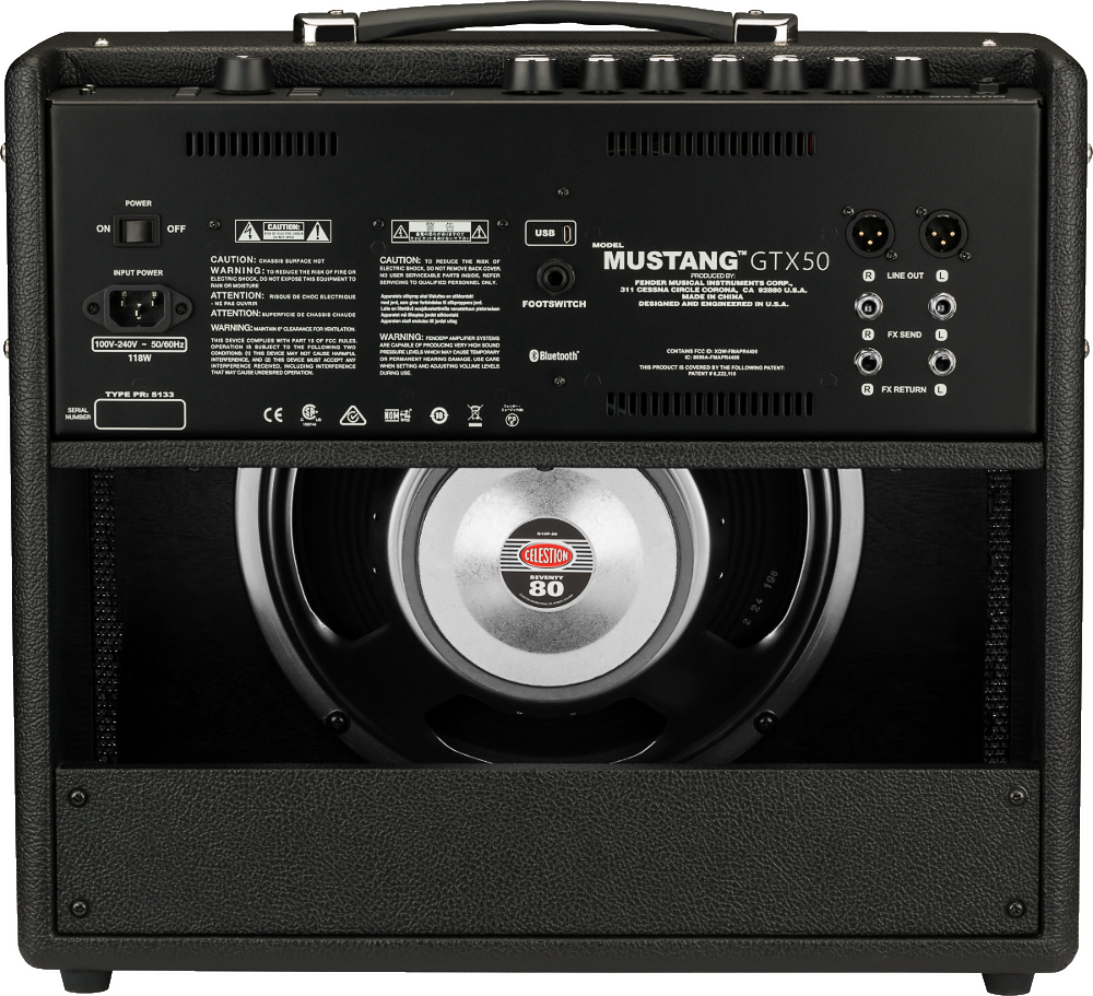 The image shows the back panel of a Fender Mustang GTX50 guitar amplifier. It features a Celestion speaker visible through the open back, multiple I/O options including XLR outputs, FX loop, USB, footswitch, and Bluetooth connectivity. The amp is covered in black tolex with a sturdy handle and supports 100V-240V AC power. This 50-watt digital modeling amp offers versatile tones and modern features for practice and performance.