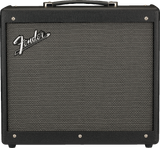 The image shows a classic Fender combo guitar amplifier with a black textured vinyl exterior, silver corner protectors, and a sturdy handle. The front features the distinctive Fender logo on the gray/silver speaker grille cloth. This portable amp combines the amplifier and speaker in one unit, known for its clean tones and iconic sound favored by musicians across genres.