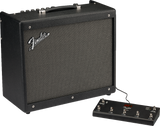 The image shows a black Fender combo guitar amplifier with the Fender logo on the front grille and control knobs on top. Connected to it is a black footswitch with multiple buttons and red labeling, also displaying Fender branding. This setup allows guitarists to remotely control amp functions like channel switching and effects during performances. It represents classic Fender amplification equipment from a leading guitar brand.