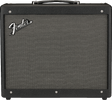The image shows a classic black Fender combo guitar amplifier with the iconic white Fender logo on the front grille. It features a rectangular design, textured black exterior, black and silver woven grille cloth, a black carrying handle on top, and visible mounting screws. This amp combines amplifier and speaker in one unit, commonly used by guitarists, and represents Fender’s well-known quality and reputation in the industry.