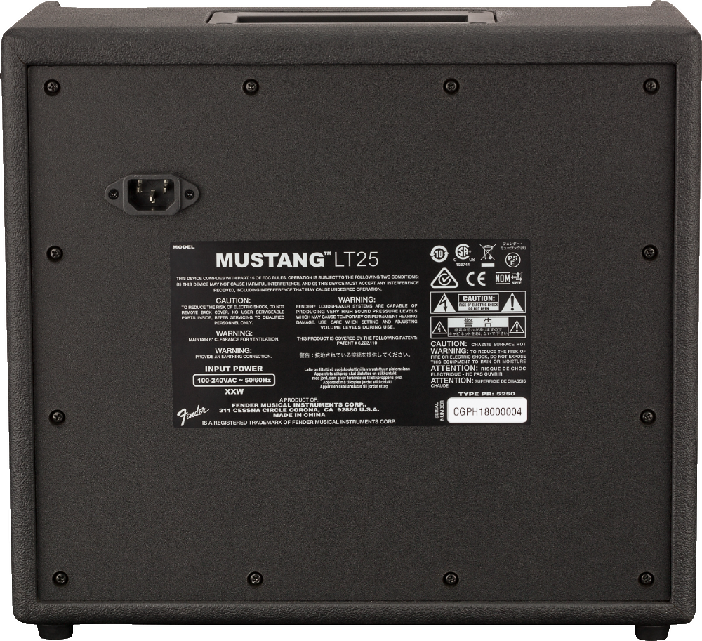 The image shows the back panel of a Fender Mustang LT25 guitar amplifier. It features a Fender logo and model label, a 25-watt power rating, an IEC power inlet, a specifications panel with technical details and safety warnings, the serial number in the bottom right, and ventilation screws around the edges. The panel lists input power (100-240V AC, 50/60Hz), certifications, and manufacturing info.