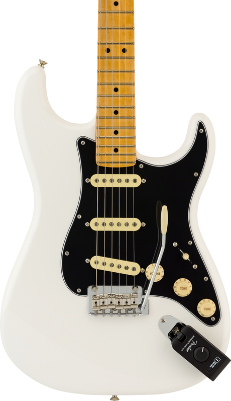 The image shows a classic white/cream Fender Stratocaster-style electric guitar with a maple neck and fretboard. It features a black pickguard, three cream single-coil pickups, chrome bridge and tuning pegs, cream control knobs, and a 5-way selector switch. Standard fret markers and six strings are visible. A small black device is in the lower right corner. The guitar displays the iconic Stratocaster body shape and hardware.