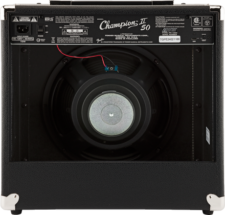 The image shows the back panel of a Fender Champion II 50 guitar amplifier with a black tolex finish and metal corner protectors. It features an open-back 12-inch speaker cabinet, power rating of 100-120V, 50/60Hz, 110W, and various safety labels. Red and blue speaker wiring is visible. Made in Thailand, this 50-watt amp offers mid-level volume and projection with a spacious, ambient sound ideal for practice and small performances.