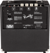 The image shows the back panel of a Fender Rumble 15 bass amplifier, a compact 15W practice amp. Visible features include the Fender Rumble branding, power switch, IEC power input, carry handle, four cream-colored control knobs, safety labels, model PR 2490, and serial number area. The black textured cabinet has corner protectors, reflecting Fender’s durable design ideal for home practice and small gigs.
