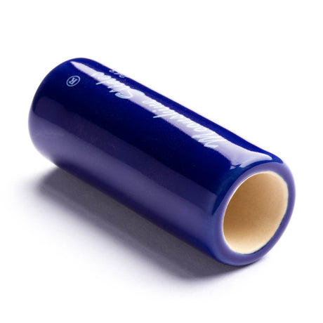 A blue ceramic guitar slide on a white background