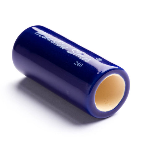 A blue ceramic guitar slide on a white background