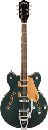 The image shows a Gretsch hollow-body electric guitar with a dark green/teal finish and f-holes. It features two humbucking pickups with gold pickup rings, a Bigsby vibrato tailpiece, chrome hardware, and an orange pickguard. The rosewood fingerboard has standard fret markers, and multiple volume/tone knobs are on the lower bout. The black headstock displays the Gretsch logo, typical of their vintage-inspired semi-acoustic models.