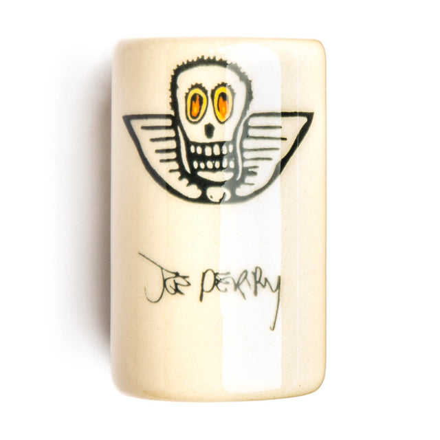 a white ceramic guitar slide with a skull design and 'Joe Perry' branding on a white background