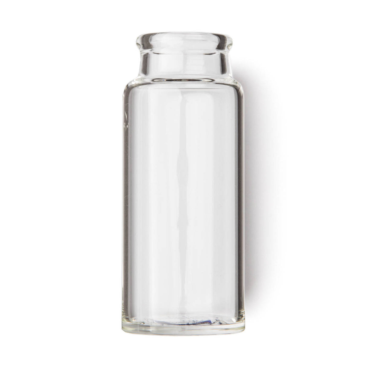 Clear glass bottle guitar slide on a white background