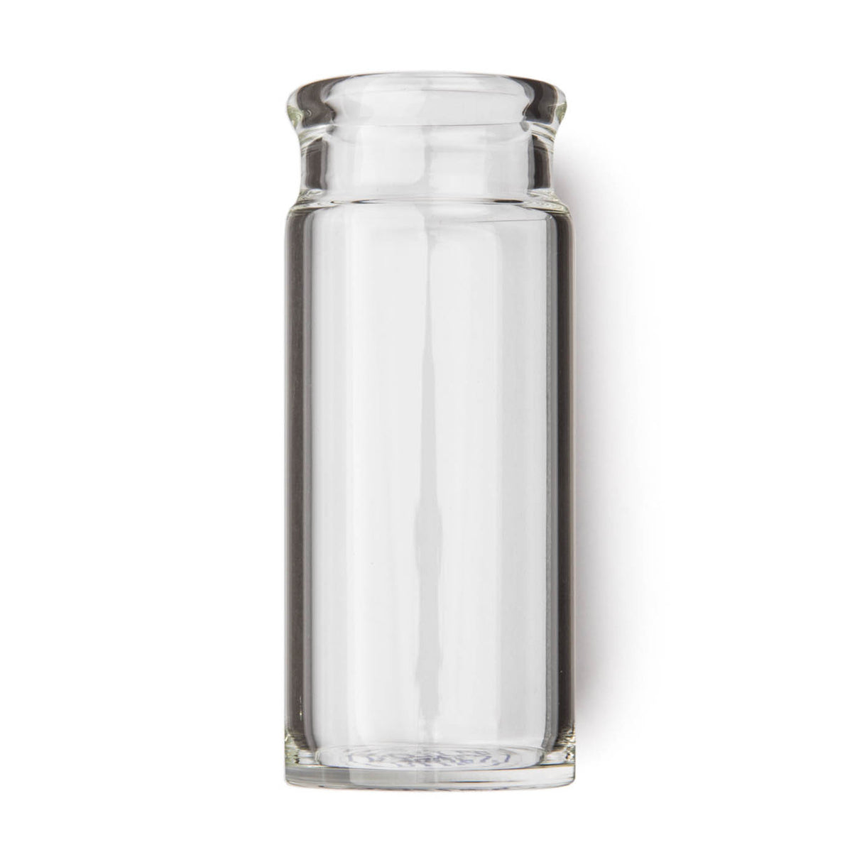 Clear glass bottle guitar slide on a white background