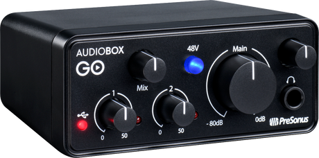 The image shows a PreSonus AudioBox GO, a compact 2-channel USB audio interface for recording and music production. It features input gain controls, 48V phantom power (blue LED), mix control, main output volume knob, headphone jack (3.5mm), and USB connectivity (red LED). Markings indicate gain and output levels. Popular for its portability, bus-powered design, and suitability for musicians, podcasters, and home studios.