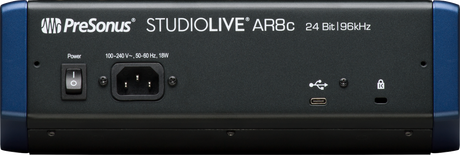 The image shows the back panel of a PreSonus StudioLive AR8c digital audio mixer/interface. Visible features include the AR8c branding, 24-bit/96kHz audio specs, a 100-240V power input, a USB-C port for computer connection, and an additional accessory port. This professional mixer combines analog mixing with digital interface capabilities, ideal for studios, podcasting, and live sound applications.