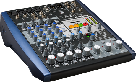 The image shows a PreSonus StudioLive AR8c, a compact 8-channel analog mixer with XLR/TRS inputs, multiple outputs, and channel faders. It features gain and EQ controls, blue-ringed knobs, built-in digital effects, USB and SD card connectivity, and a digital display. Designed for studio or live use, it has a sturdy, angled desktop form factor in black and blue, ideal for musicians, podcasters, and small studios.