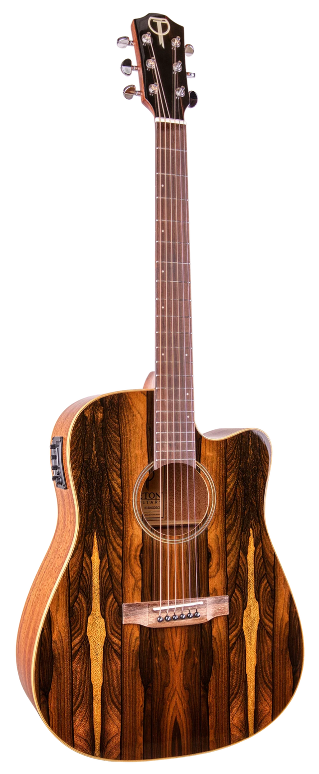 The image shows a beautiful acoustic-electric guitar with a cutaway design for easy upper fret access. It features rich, dark exotic wood with striped grain patterns and lighter accent strips. The guitar has chrome tuning pegs, electronic controls on the side, and decorative inlays around the sound hole. Marked by a "T" logo on the headstock, it reflects premium craftsmanship and high-quality materials.