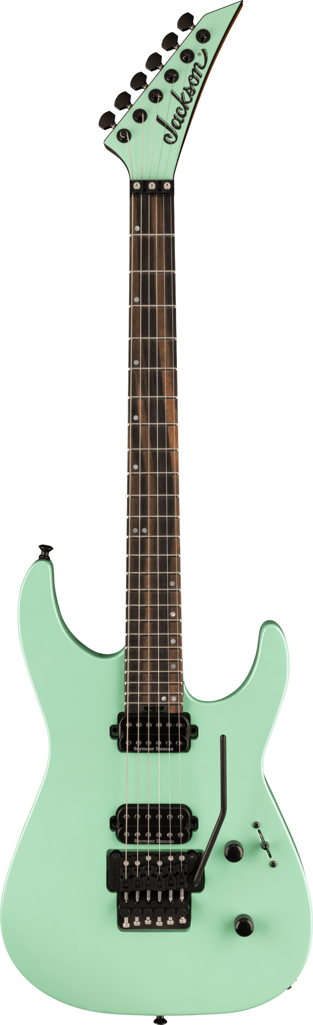 The image shows a seafoam green Jackson electric guitar with a pointed headstock and six tuning pegs. It has a dark wood fretboard with dot inlays, two black humbucker pickups, a Floyd Rose tremolo bridge, and volume and tone knobs. Featuring a superstrat body shape with cutaways, this guitar is designed for rock and metal styles, blending vintage color with aggressive modern design.