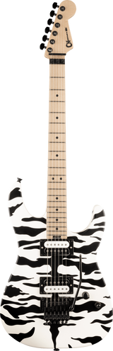 The image shows a Charvel electric guitar with a white body featuring a bold black abstract or camouflage pattern. It has two black humbucker pickups, a black tremolo bridge, black control knobs, and hardware. The neck is light-colored with dot inlays, and the headstock has black tuning pegs. This modern guitar is designed for rock or metal styles, combining visual impact with versatile hardware for expressive playing.