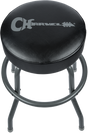 The image shows a black padded musician’s stool with a circular seat on four metal legs. The seat features the Charvel logo on its vinyl or leather surface. This adjustable-height stool, commonly used by guitarists, drummers, and keyboardists, offers comfort for long sessions. As branded Charvel merchandise, it complements their electric guitar products and fits a music room’s aesthetic.