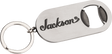 The image shows a metal keychain bottle opener branded with the Jackson logo, a well-known electric guitar manufacturer popular in rock and metal music. This promotional merchandise item highlights Jackson’s identity within the guitar industry, where they produce accessories alongside their high-performance guitars like the Soloist, Dinky, and Rhoads models.