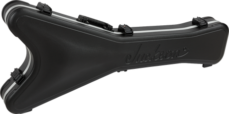 The image shows a black molded hard shell guitar case with the "Jackson" logo embossed on it. It features 3-4 secure latches and a contoured shape to fit electric guitars. Made from heavy-duty plastic or composite, this professional-grade case offers strong protection for transport and storage, primarily designed for Jackson guitars but may fit similar models.