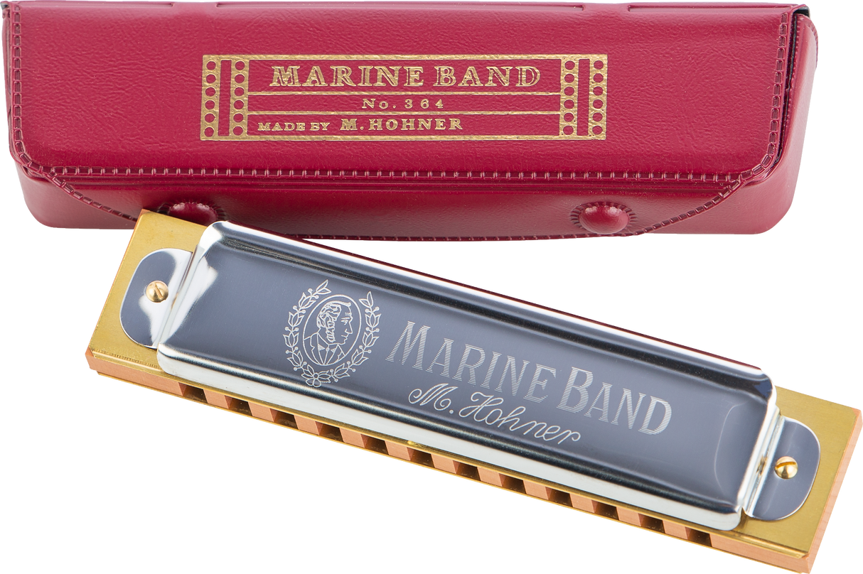 The image shows a M. Hohner Marine Band harmonica (model No. 364) with a silver top plate, brass comb, and decorative portrait medallion. Beside it is its red leather carrying case with gold embossed "MARINE BAND No. 364" text, "MADE BY M. HOHNER" marking, and snap closure. This vintage-style harmonica is iconic for its wooden comb and warm tone, popular in blues, folk, and country music.