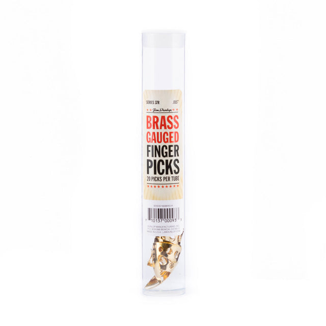 A clear plastic tube filled with brass guitar fingerpicks on a white background