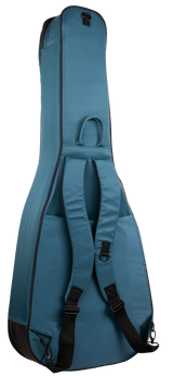 The image shows a teal/turquoise soft-sided guitar gig bag with black trim. It features padded nylon construction, a full-length zipper, and an external accessory pocket. Carrying options include dual padded shoulder straps and a top handle. A front D-ring allows attaching accessories. This lightweight, protective bag is ideal for transporting acoustic or electric guitars to lessons, rehearsals, or gigs.