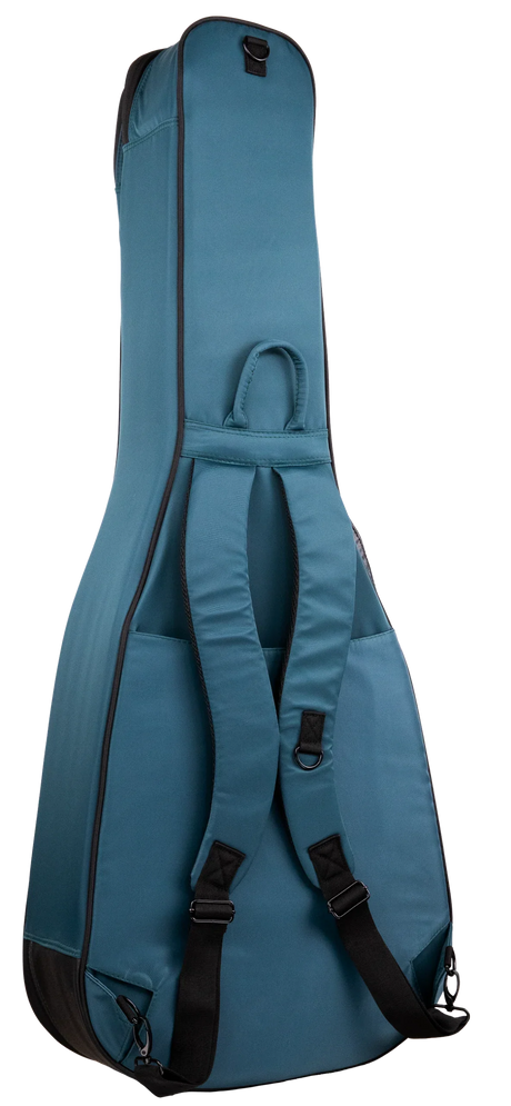 The image shows a teal/turquoise soft-sided guitar gig bag with black trim. It features padded nylon construction, a full-length zipper, and an external accessory pocket. Carrying options include dual padded shoulder straps and a top handle. A front D-ring allows attaching accessories. This lightweight, protective bag is ideal for transporting acoustic or electric guitars to lessons, rehearsals, or gigs.