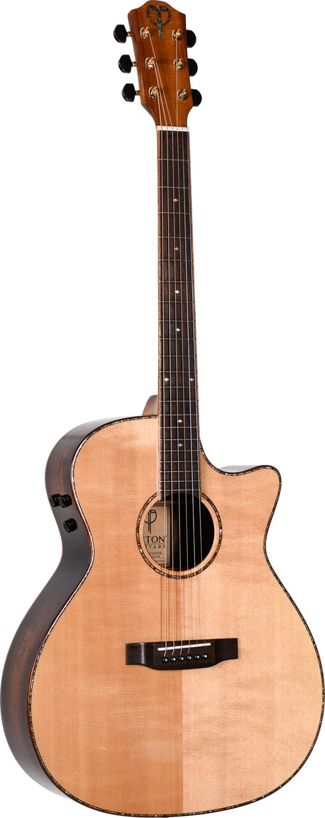 The image shows an acoustic-electric guitar with a natural wood finish, single cutaway, and six strings. It features built-in pickups and a control panel on the upper bout, a round sound hole with decorative rosette, a dark wooden bridge with a bone or synthetic saddle, and a wooden headstock with gold tuning machines and inlay. The label inside the sound hole shows "TON," suggesting the brand.
